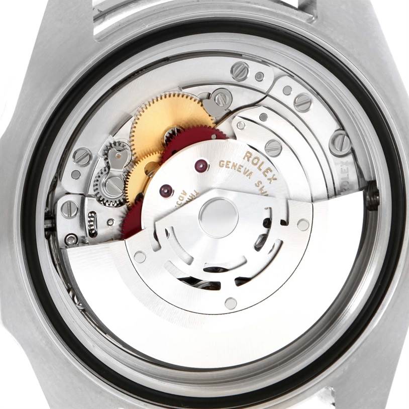 This image shows a close-up of the Rolex Sea-Dweller 116600 Men's Stainless Steel Black Dial 116600 Men's Stainless Steel Black Dial watch's internal mechanism from the back angle.