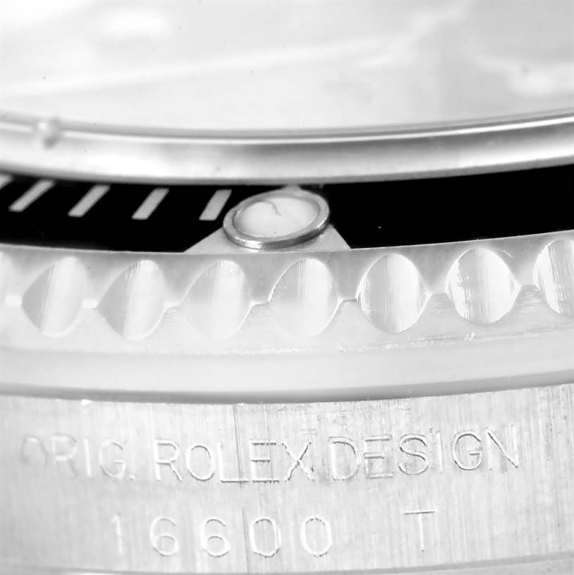 This close-up shows the bezel, edge texture, and part of the casing of the Rolex Sea-Dweller 16600 Men's Stainless Steel Black Dial 16600 Men's Stainless Steel Black Dial watch, with the model number 16600.