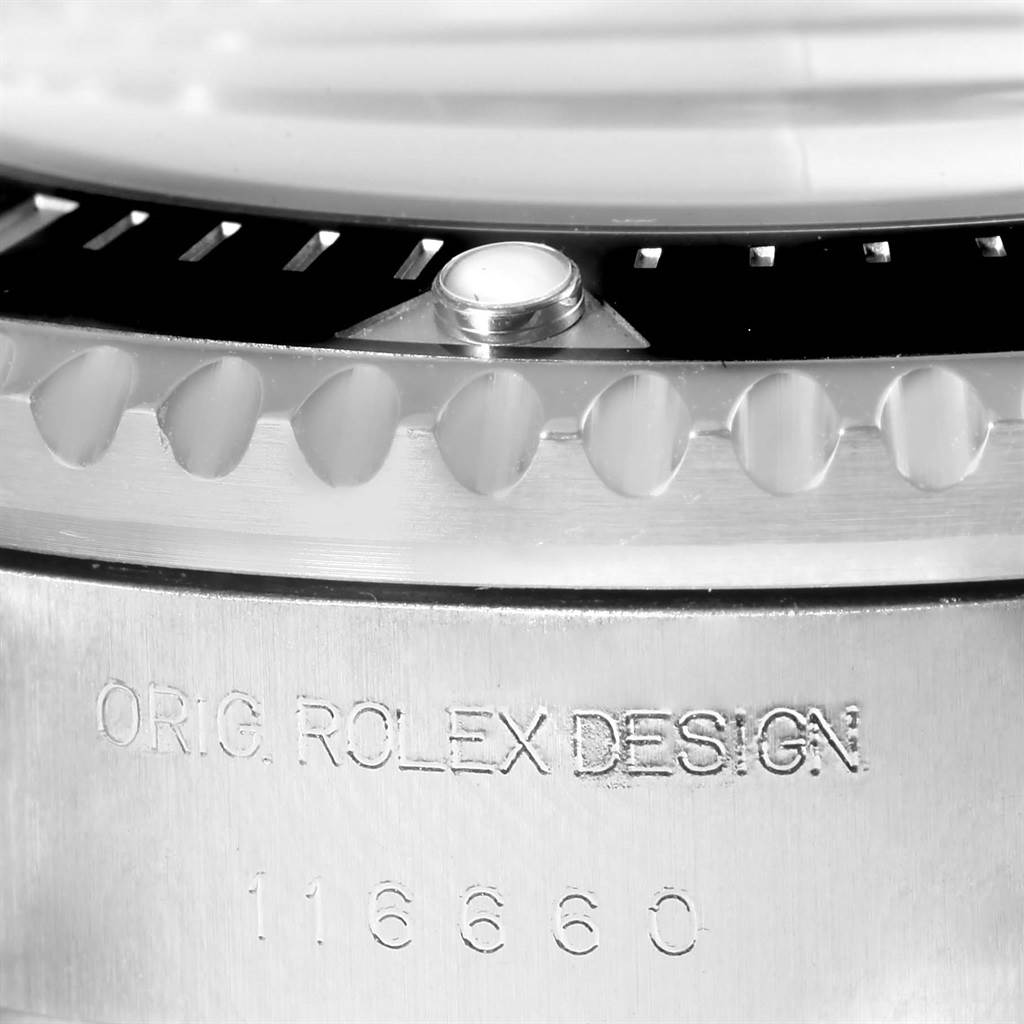 The image shows a close-up of the bezel, marker, and engraved text on the Rolex Sea-Dweller 116660 Men's Stainless Steel Blue Dial 116660 Men's Stainless Steel Blue Dial watch.