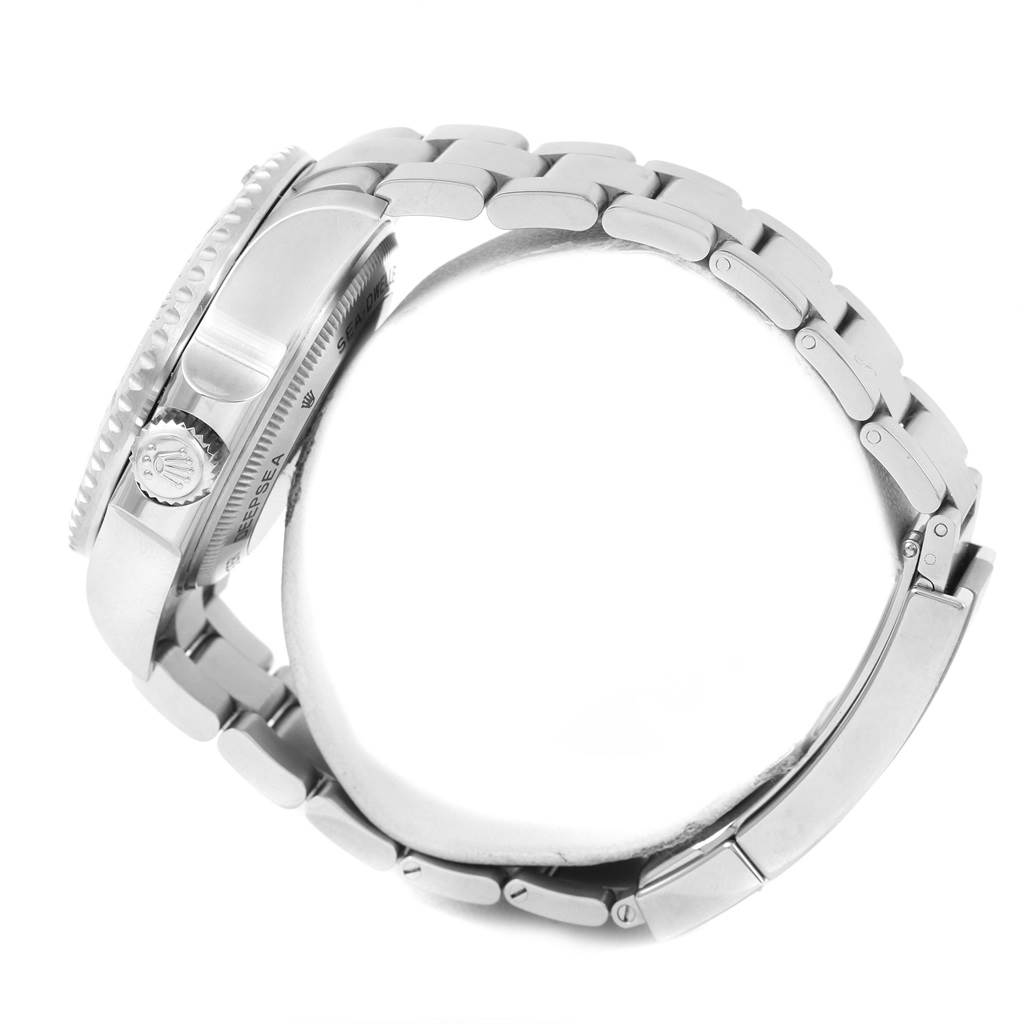 The image shows a side view of a Rolex Sea-Dweller 116660 Men's Stainless Steel Blue Dial 116660 Men's Stainless Steel Blue Dial watch, highlighting the crown, part of the bezel, and the metal bracelet.