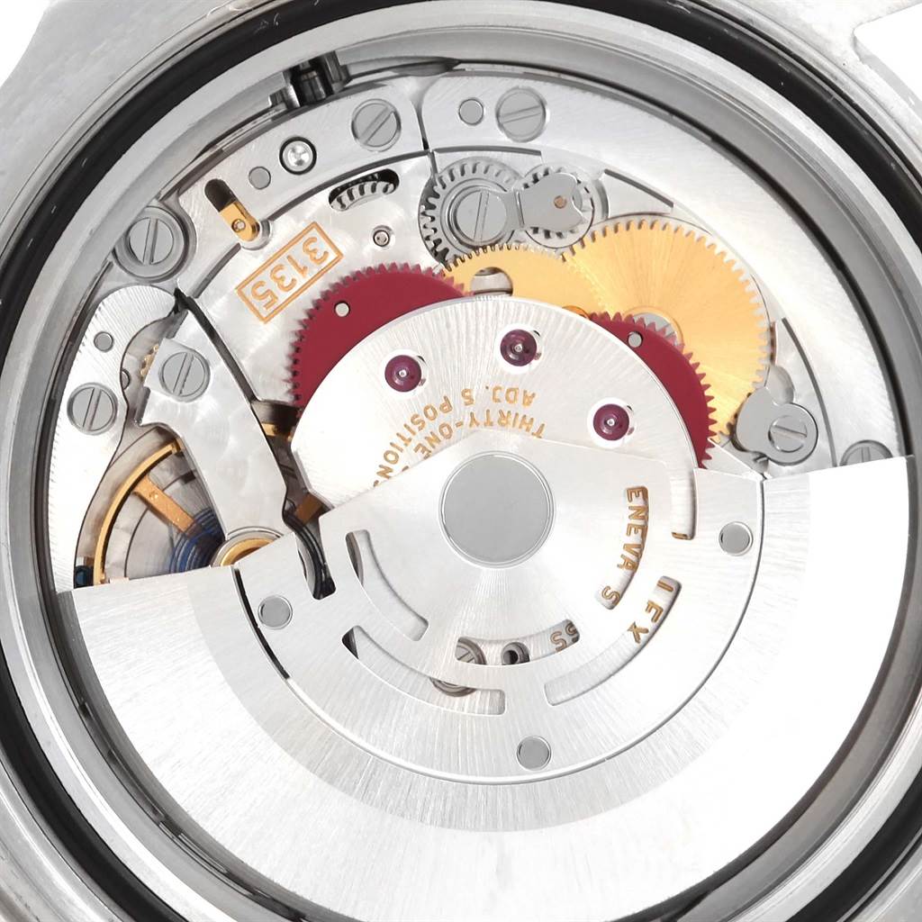 This image shows the internal movement mechanism of the Rolex Sea-Dweller 116600 Men's Stainless Steel Black Dial 116600 Men's Stainless Steel Black Dial watch at a close-up angle.