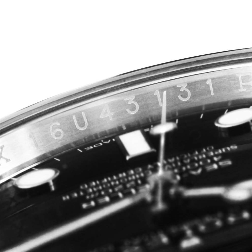 The image shows a close-up of the dial and edge of the bezel of the Rolex Sea-Dweller 116600 Men's Stainless Steel Black Dial 116600 Men's Stainless Steel Black Dial watch.