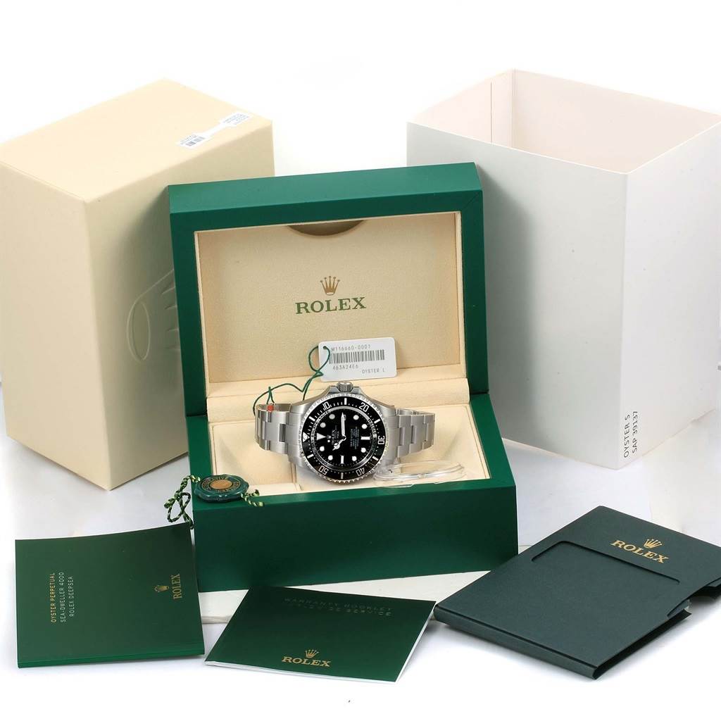 The image shows a Rolex Sea-Dweller 116660 Men's Stainless Steel Black Dial 116660 Men's Stainless Steel Black Dial watch displayed in its green box with accompanying documentation and outer packaging.