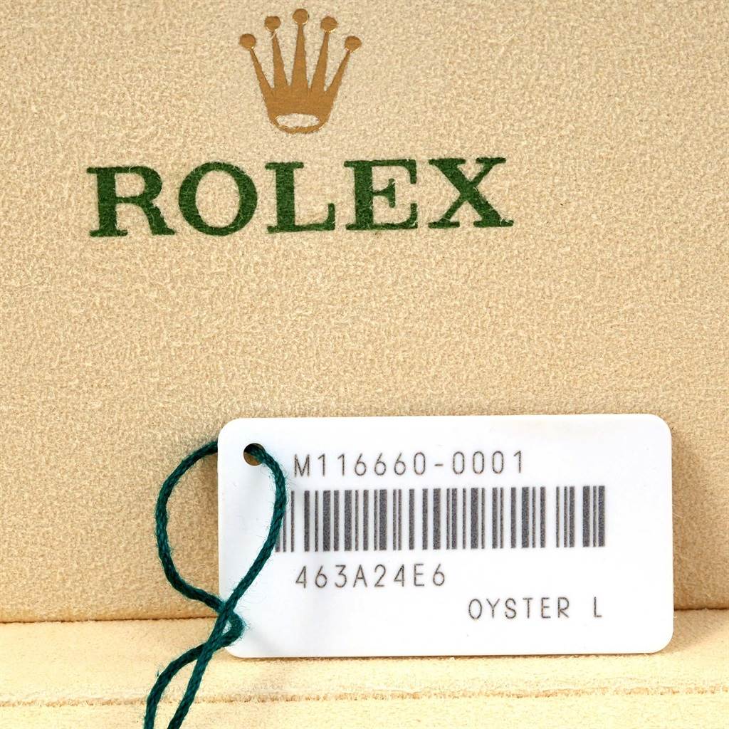 The image shows the brand logo of Rolex and a tag with model details for the Sea-Dweller watch.