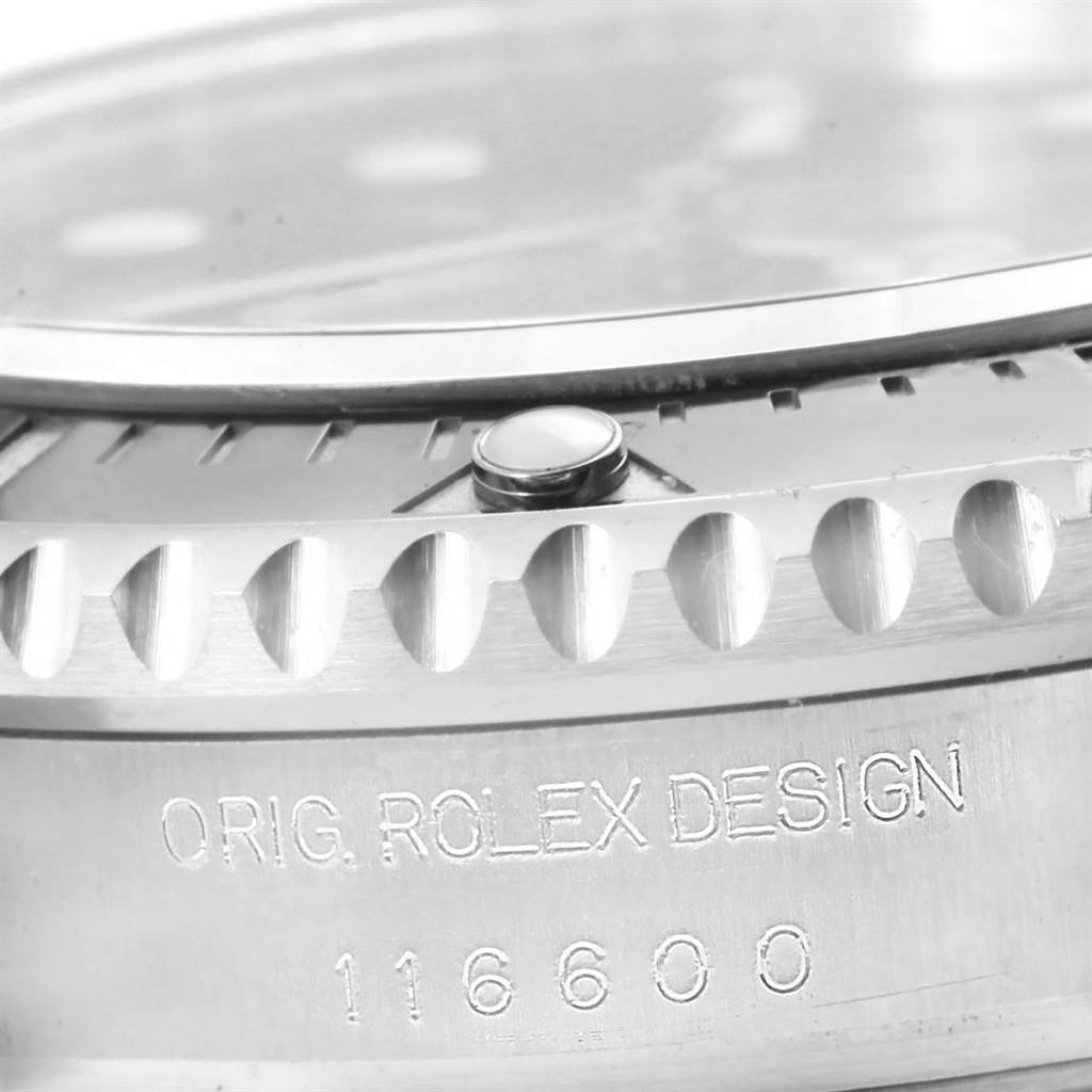 This close-up angle shows the bezel, crystal edge, and engraved details of the Rolex Sea-Dweller 116600 Men's Stainless Steel Black Dial 116600 Men's Stainless Steel Black Dial watch model 116600.