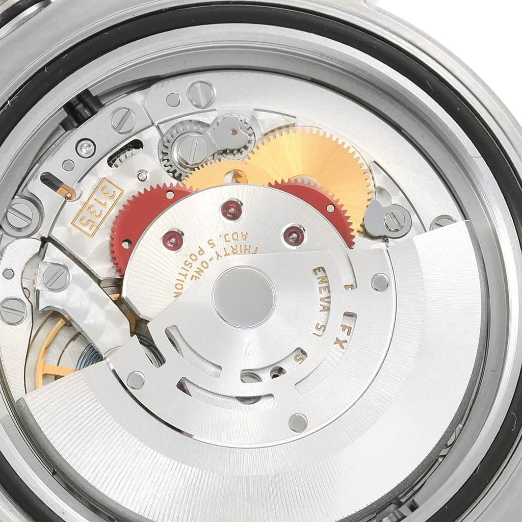 This close-up angle shows the intricate internal mechanics of the Rolex Sea-Dweller 116600 Men
s Stainless Steel Black Dial 116600 Men
s Stainless Steel Black Dial watch movement.