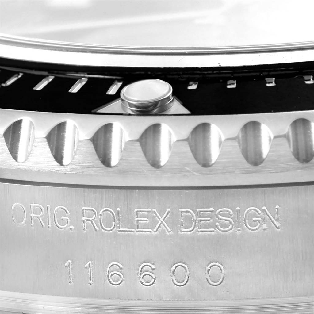 This close-up image shows the engraved side case and bezel of the Rolex Sea-Dweller 116600 Men
s Stainless Steel Black Dial 116600 Men
s Stainless Steel Black Dial watch.