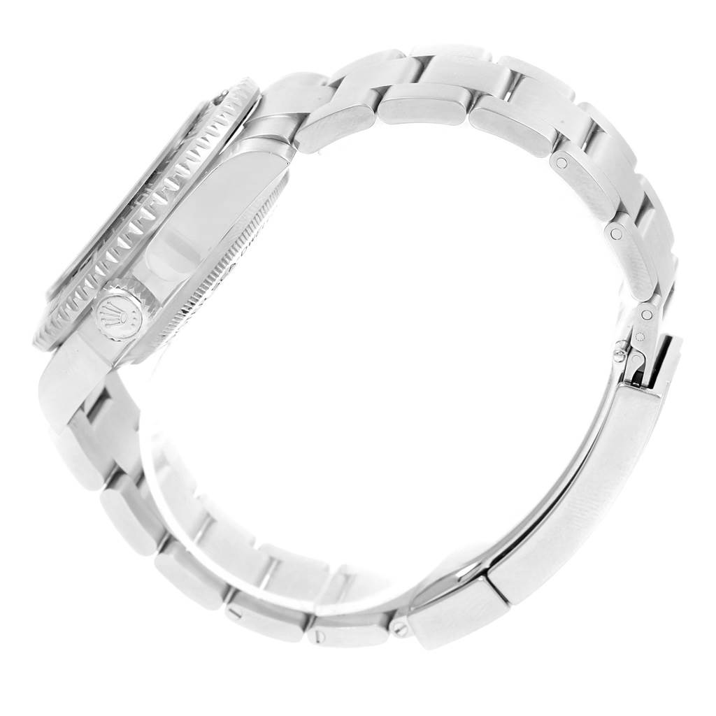 The image shows a side profile view of a Rolex Sea-Dweller 116600 Men
s Stainless Steel Black Dial 116600 Men
s Stainless Steel Black Dial watch, highlighting its bracelet, clasp, and crown.