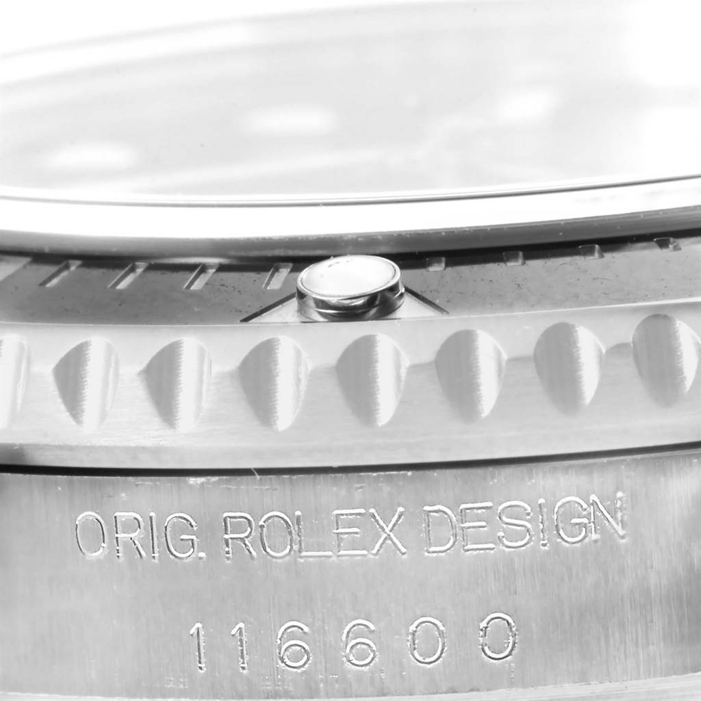 This close-up image shows the bezel and engraved case side of the Rolex Sea-Dweller 116600 Men
s Stainless Steel Black Dial 116600 Men
s Stainless Steel Black Dial 116600.