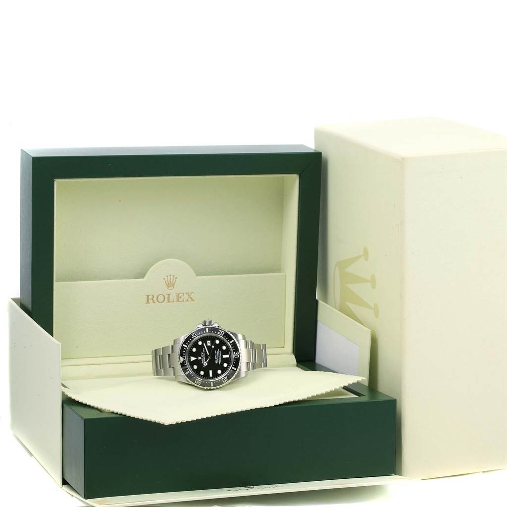 A Rolex Sea-Dweller 116600 Men
s Stainless Steel Black Dial 116600 Men
s Stainless Steel Black Dial watch is shown from the front, displayed in an open Rolex box with both the outer box and inner case visible.