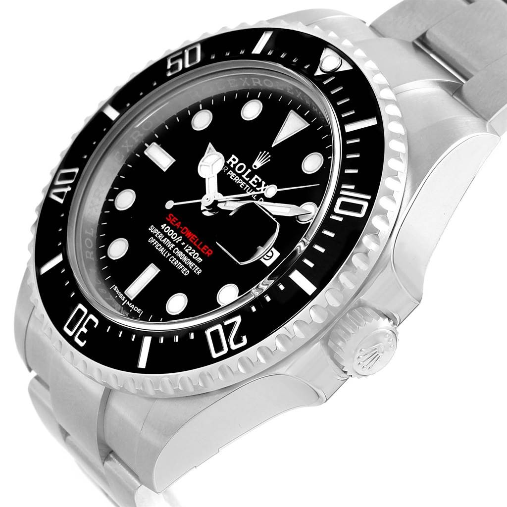 The image shows a side angle of the Rolex Sea-Dweller 126600 Men
s Stainless Steel Black Dial 126600 Men
s Stainless Steel Black Dial watch focusing on its dial, bezel, and part of the bracelet.