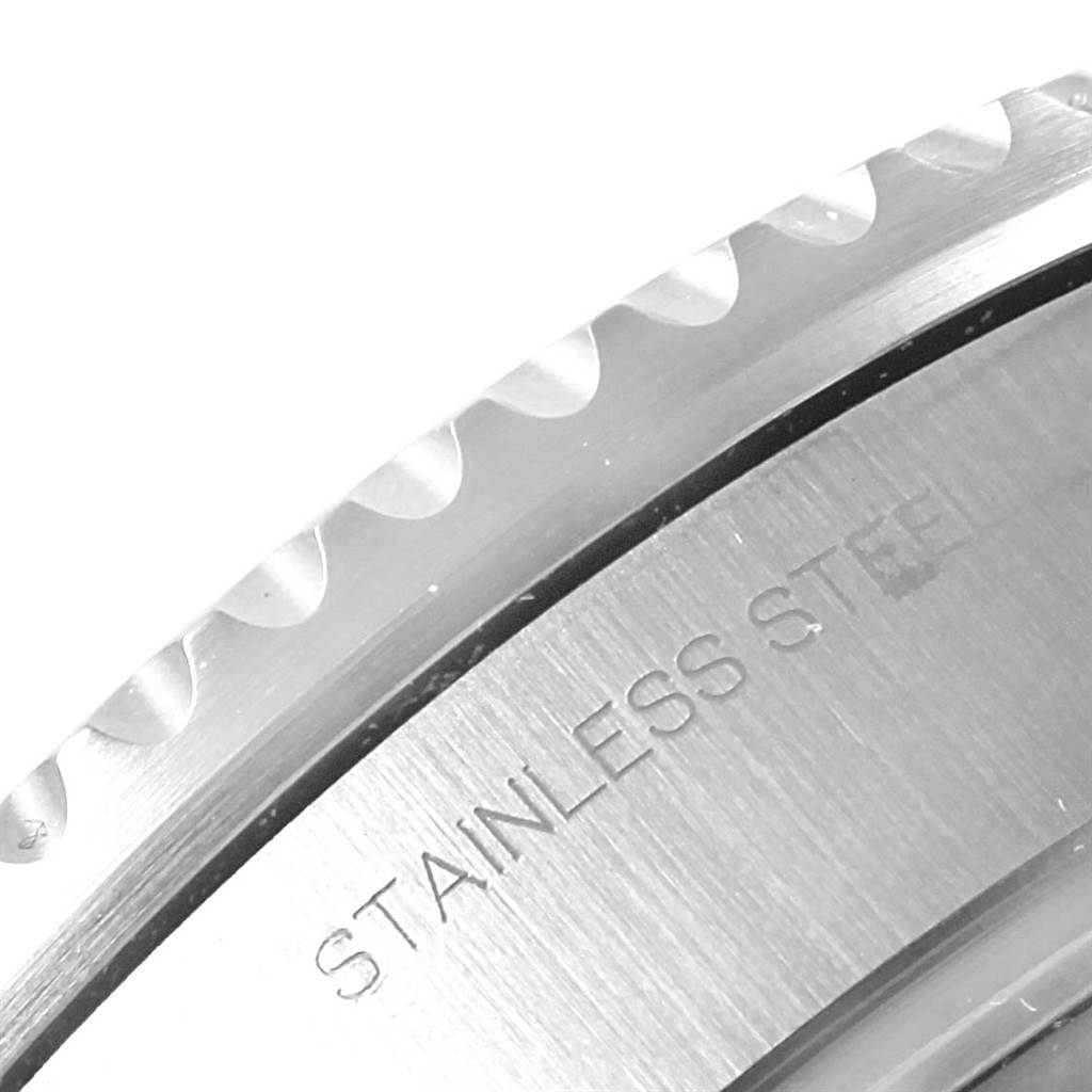 This image shows a close-up of the stainless steel bezel and case back of the Rolex Sea-Dweller 116660 Men's Stainless Steel Black Dial 116660 Men's Stainless Steel Black Dial watch.