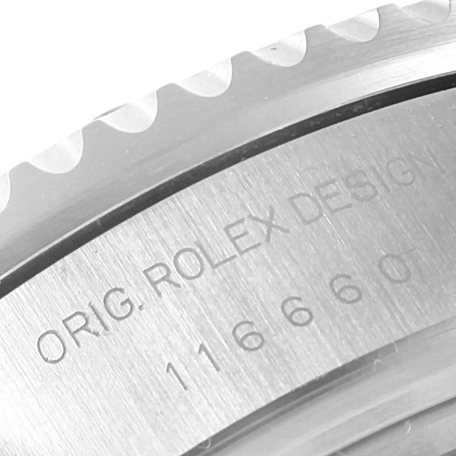 The image shows an angled close-up of the serial number and "ORIG. ROLEX DESIGN" engraving on the Rolex Sea-Dweller 116660 Men's Stainless Steel Black Dial 116660 Men's Stainless Steel Black Dial watch.