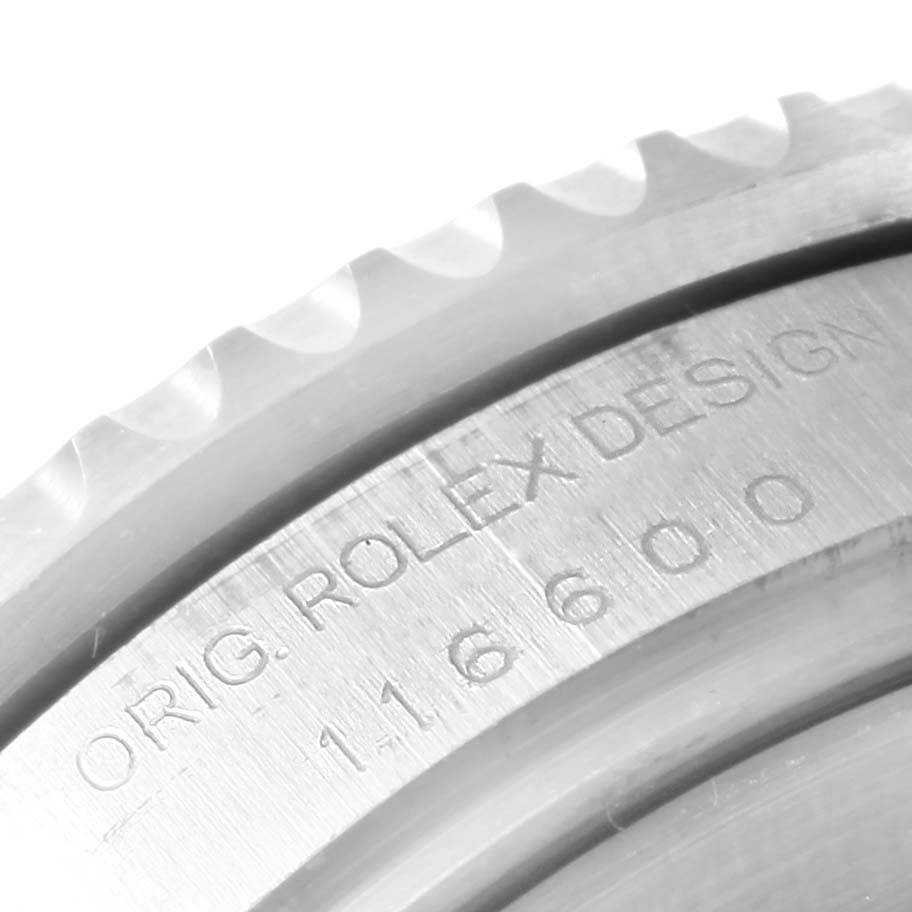 This close-up image shows the bezel edge and engraved details of the Rolex Sea-Dweller 116600 Men
s Stainless Steel Black Dial 116600 Men
s Stainless Steel Black Dial 116600 model.