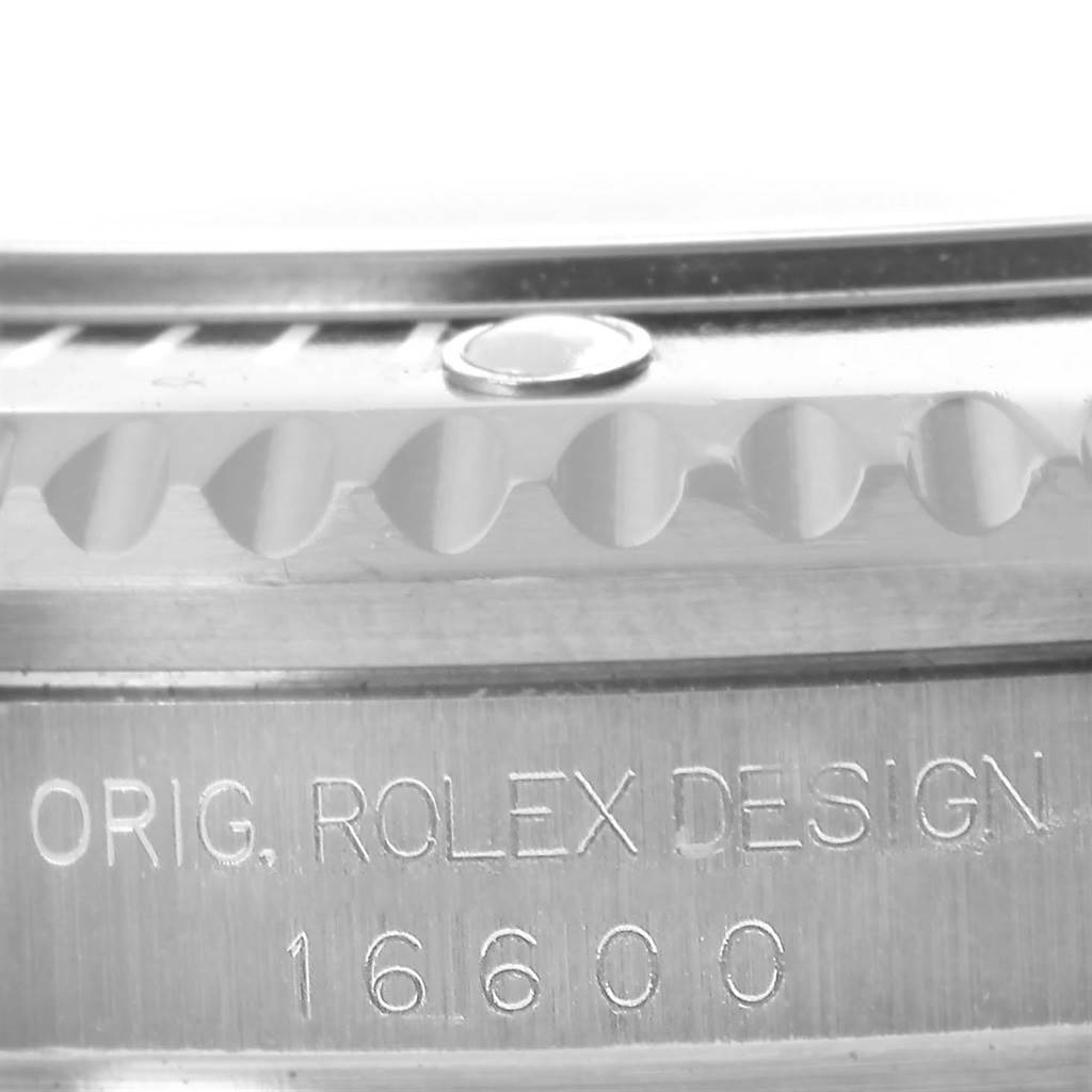 This close-up image shows the side profile engraving and bezel of the Rolex Sea-Dweller 16600 Men
s Stainless Steel Black Dial 16600 Men
s Stainless Steel Black Dial model 16600.