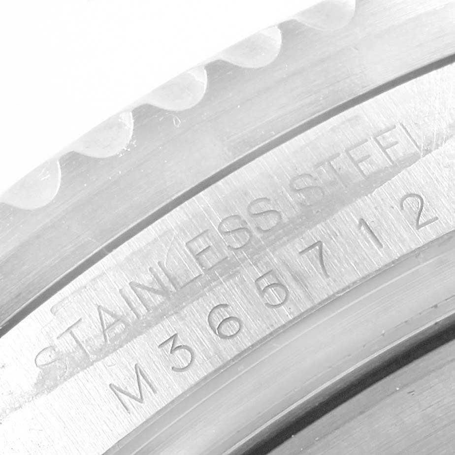 This image shows a close-up of the case side and bezel of a Rolex Sea-Dweller 16600 Men
s Stainless Steel Black Dial 16600 Men
s Stainless Steel Black Dial, highlighting the stainless steel engraving.