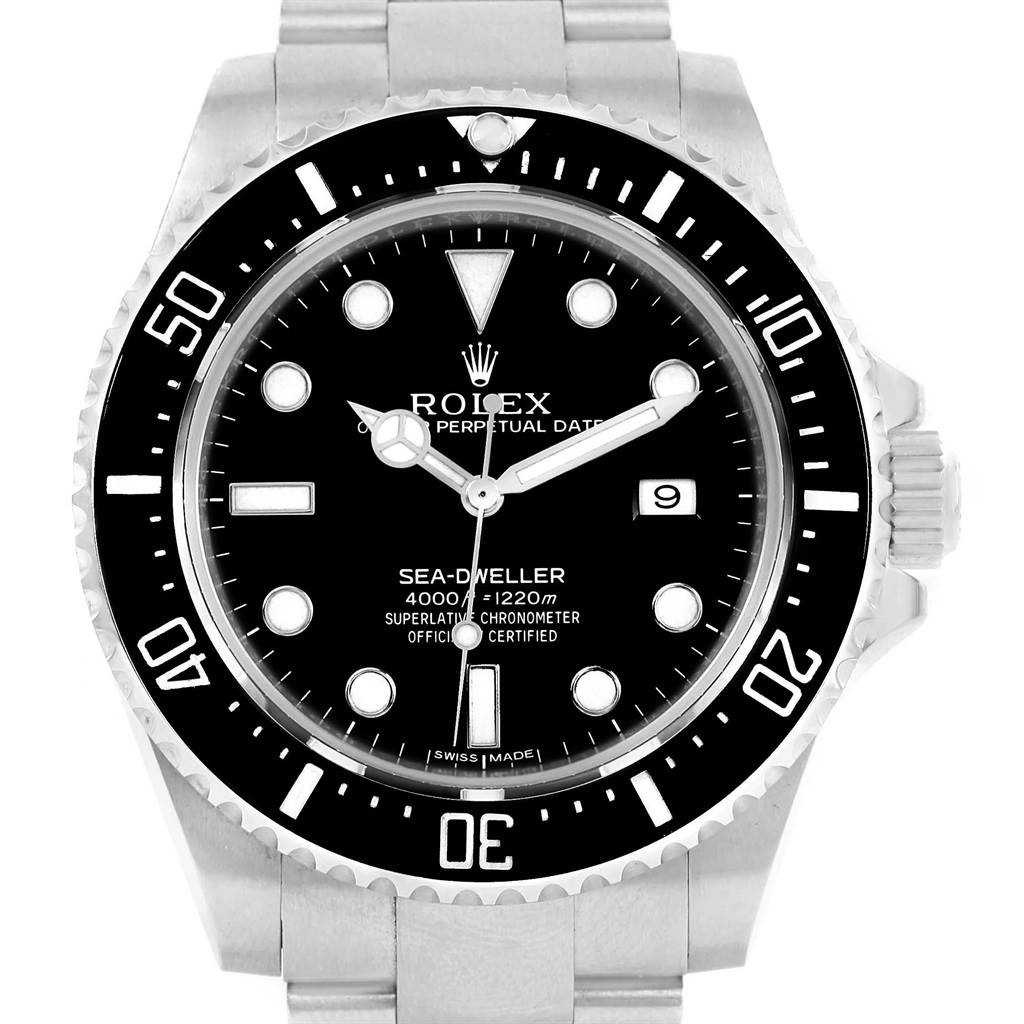 This front-facing image shows the dial, bezel, crown, and part of the bracelet of the Rolex Sea-Dweller 116600 Men's Stainless Steel Black Dial 116600 Men's Stainless Steel Black Dial watch.
