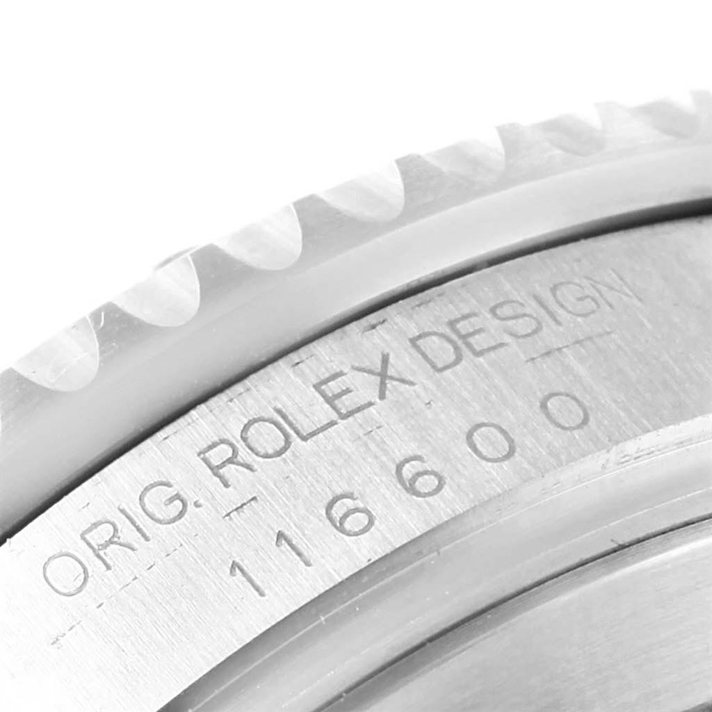This image shows a close-up of the engraving on the bezel and case side of the Rolex Sea-Dweller 116600 Men's Stainless Steel Black Dial 116600 Men's Stainless Steel Black Dial watch, model number 116600.