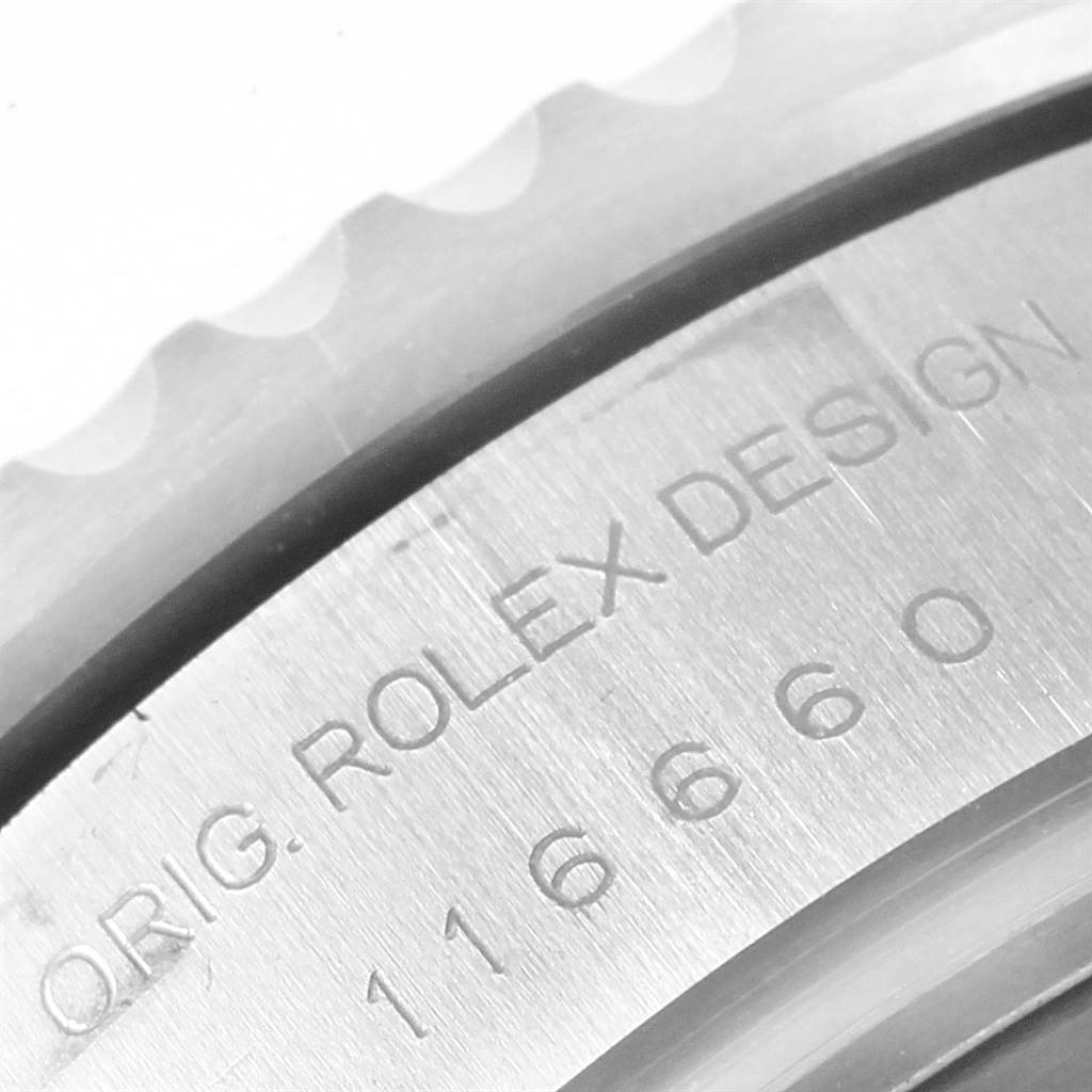 This close-up image of the Rolex Sea-Dweller 116660 Men's Stainless Steel Black Dial 116660 Men's Stainless Steel Black Dial watch shows the engraved model number and design details on the case back.