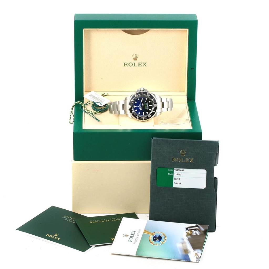 The image shows a Rolex Sea-Dweller 116660 Men's Stainless Steel Blue Dial 116660 Men's Stainless Steel Blue Dial watch in its box with accompanying documents and tags, viewed from the front.