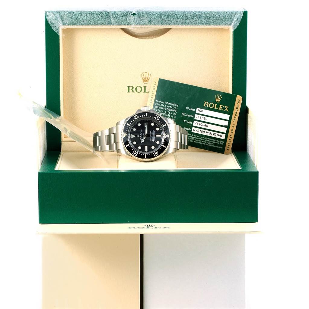 The image shows a Rolex Sea-Dweller 116660 Men's Stainless Steel Black Dial 116660 Men's Stainless Steel Black Dial watch displayed in its box alongside warranty cards.