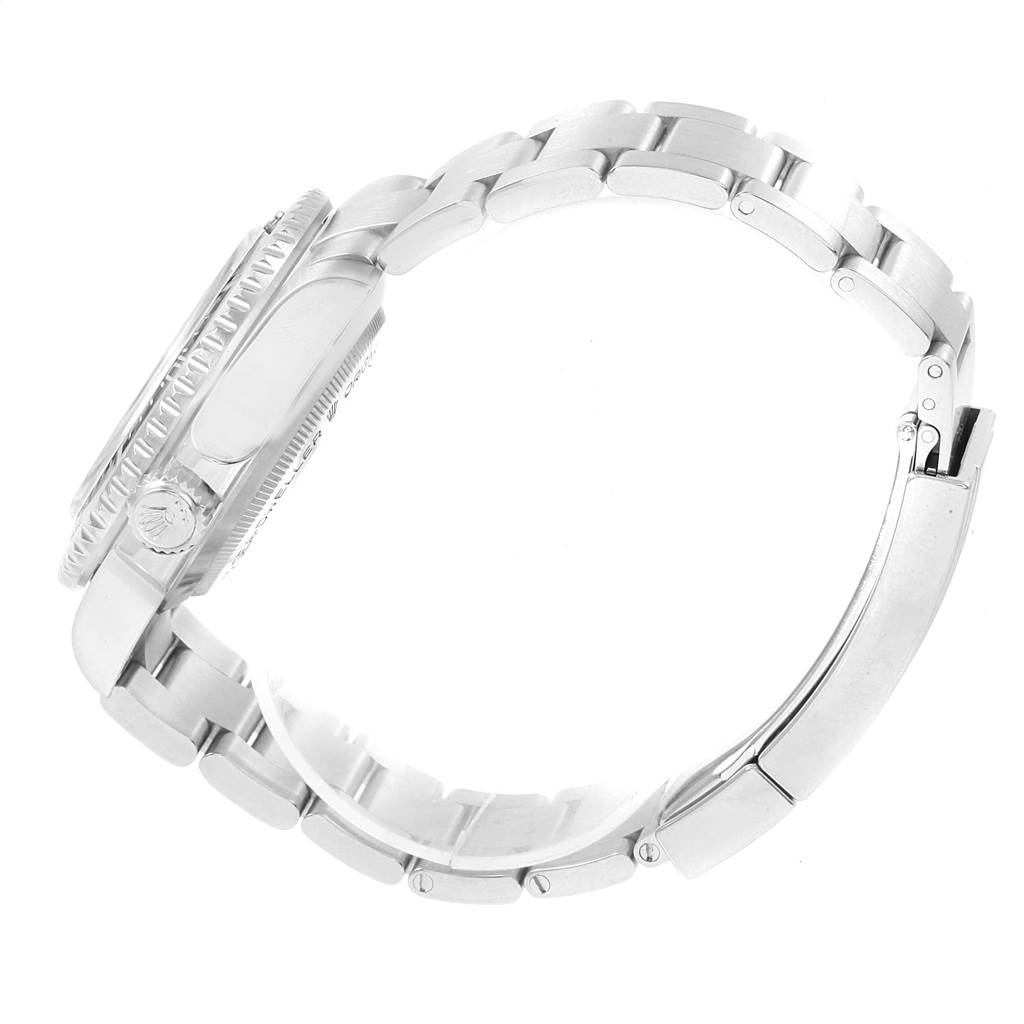 This side-angle image of the Rolex Sea-Dweller 116600 Men
s Stainless Steel Black Dial 116600 Men
s Stainless Steel Black Dial watch shows its bracelet, clasp, and side of the case with the crown.