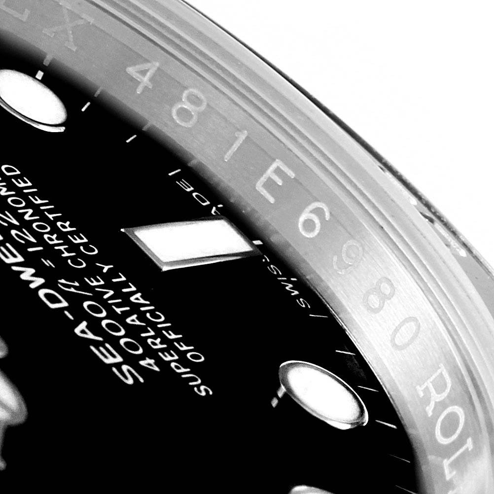 Close-up image showing the dial and part of the bezel of a Rolex Sea-Dweller 116600 Men
s Stainless Steel Black Dial 116600 Men
s Stainless Steel Black Dial watch.