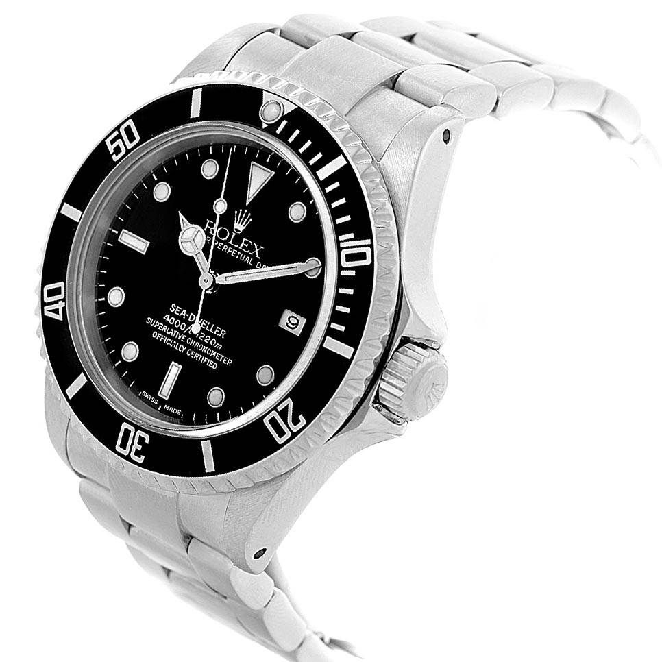 This image shows a Rolex Sea-Dweller 16600 Men
s Stainless Steel Black Dial 16600 Men
s Stainless Steel Black Dial model watch at a three-quarter angle, displaying its face, bezel, crown, and bracelet.