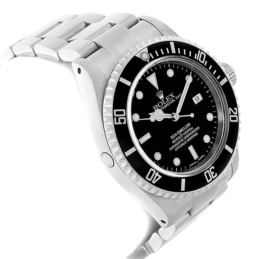 The image shows a side angle view of the Rolex Sea-Dweller 16600 Men
s Stainless Steel Black Dial 16600 Men
s Stainless Steel Black Dial watch, highlighting the bezel, dial, and metal bracelet.