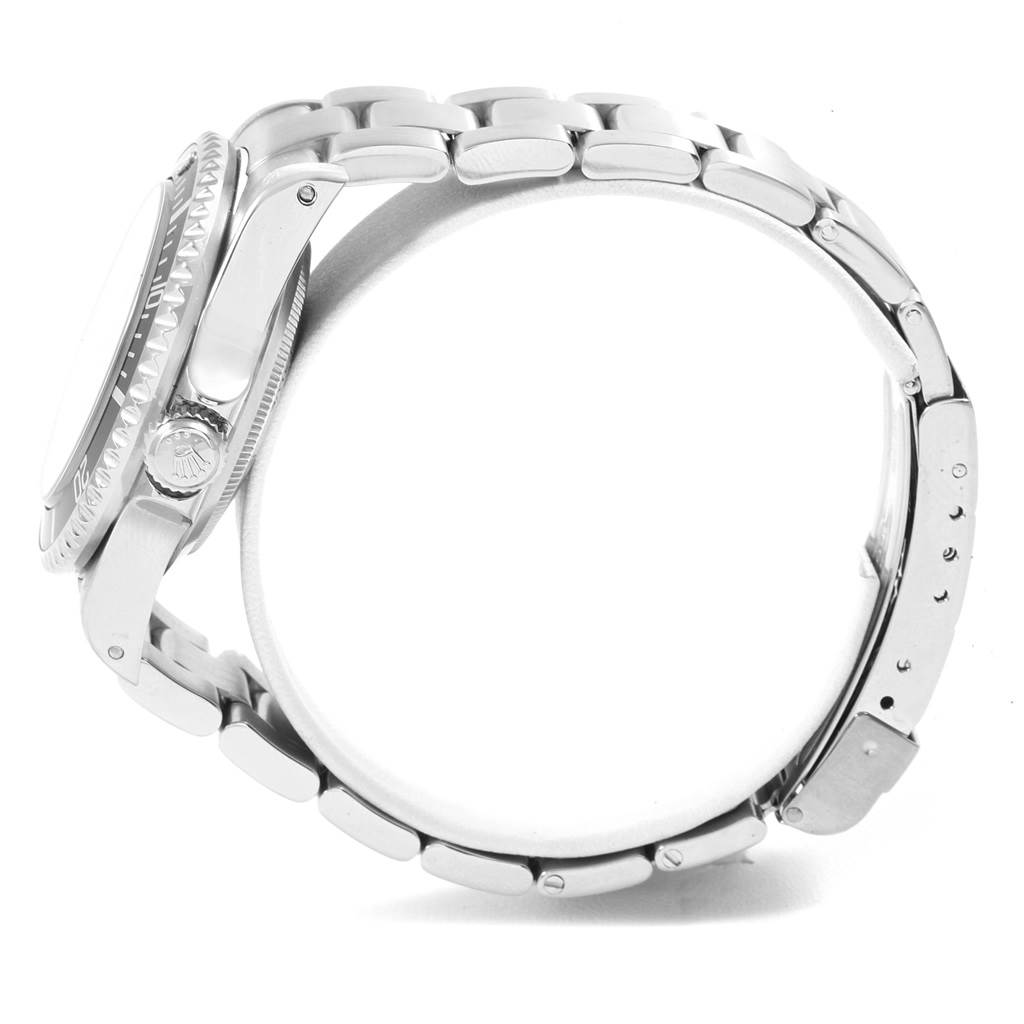 The image shows a side profile view of the Rolex Sea-Dweller 16600 Men
s Stainless Steel Black Dial 16600 Men
s Stainless Steel Black Dial watch, highlighting the crown, bezel, and bracelet.