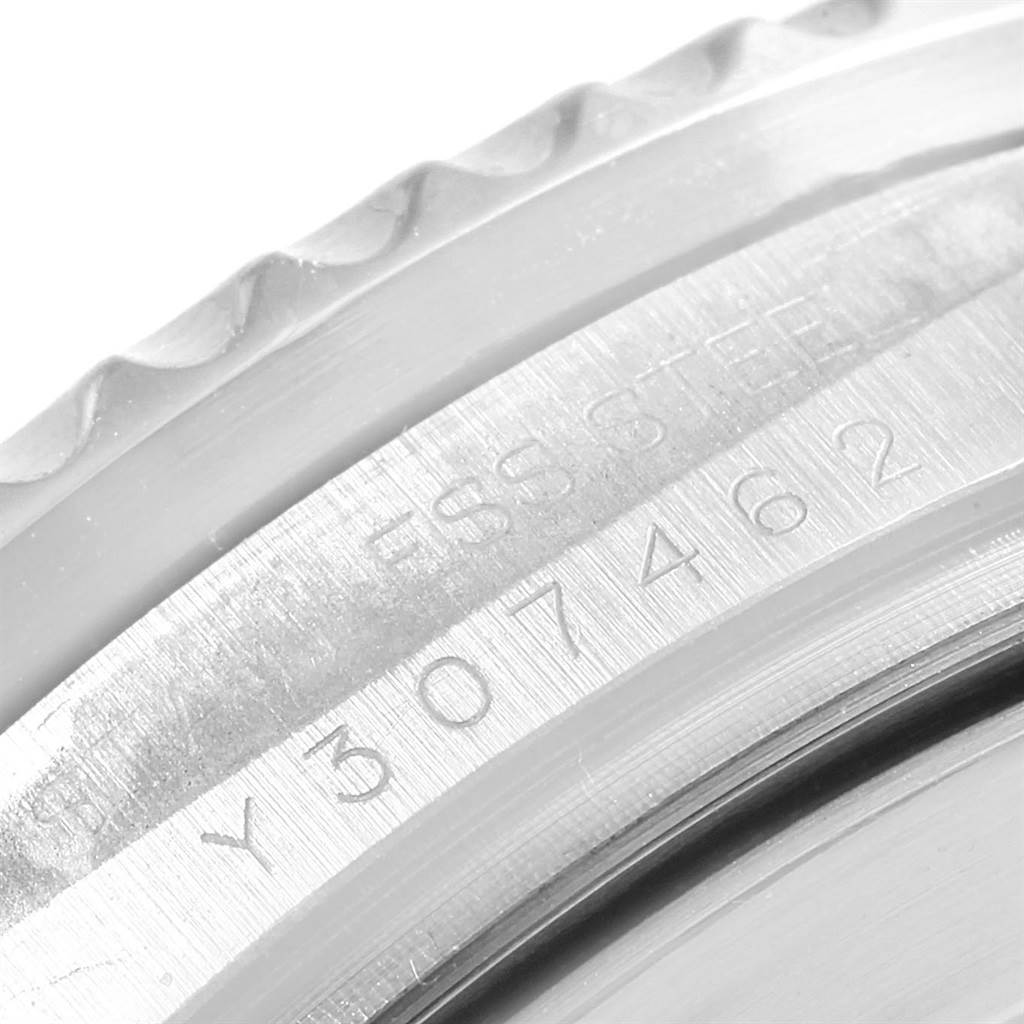 This image shows a close-up of the serial number engraving on the bezel of a Rolex Sea-Dweller 16600 Men
s Stainless Steel Black Dial 16600 Men
s Stainless Steel Black Dial watch.