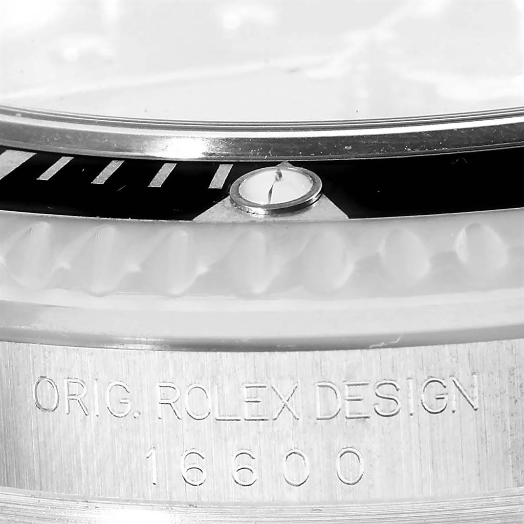 The image shows a close-up of the bezel and case, displaying "ORIG. ROLEX DESIGN 16600" of the Rolex Sea-Dweller 16600 Men
s Stainless Steel Black Dial 16600 Men
s Stainless Steel Black Dial.
