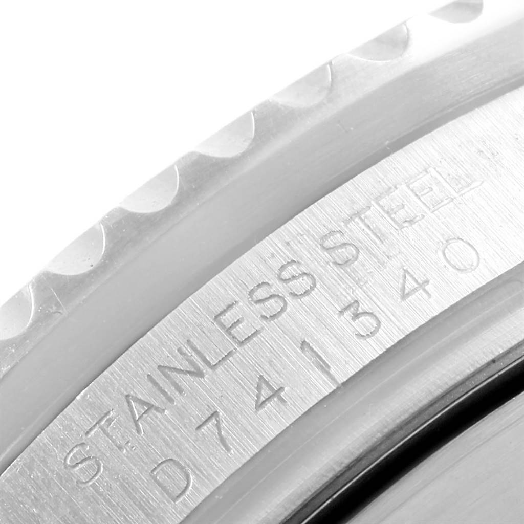 This is a close-up angle of the stainless steel case back of a Rolex Sea-Dweller 16600 Men
s Stainless Steel Black Dial 16600 Men
s Stainless Steel Black Dial watch, showing part of its serial number.