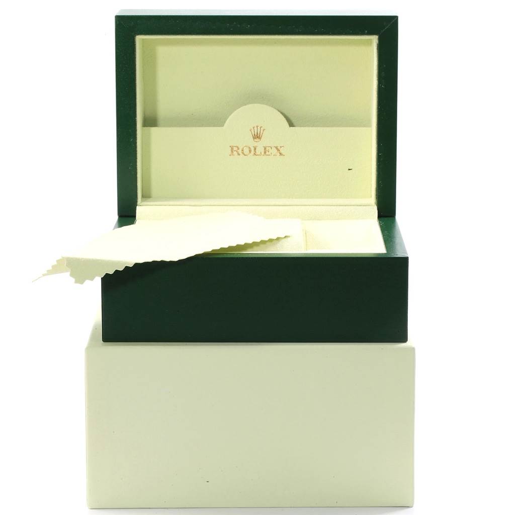 The image shows an open Rolex Sea-Dweller 16600 Men
s Stainless Steel Black Dial 16600 Men
s Stainless Steel Black Dial watch box with a cleaning cloth.