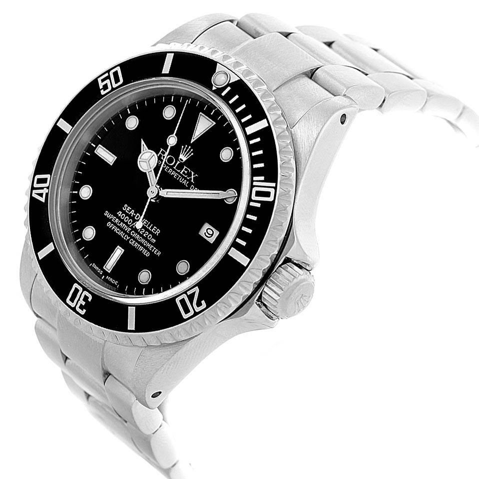 The image shows a Rolex Sea-Dweller 16600 Men
s Stainless Steel Black Dial 16600 Men
s Stainless Steel Black Dial watch angled from the side, displaying the face, bezel, crown, and part of the bracelet.