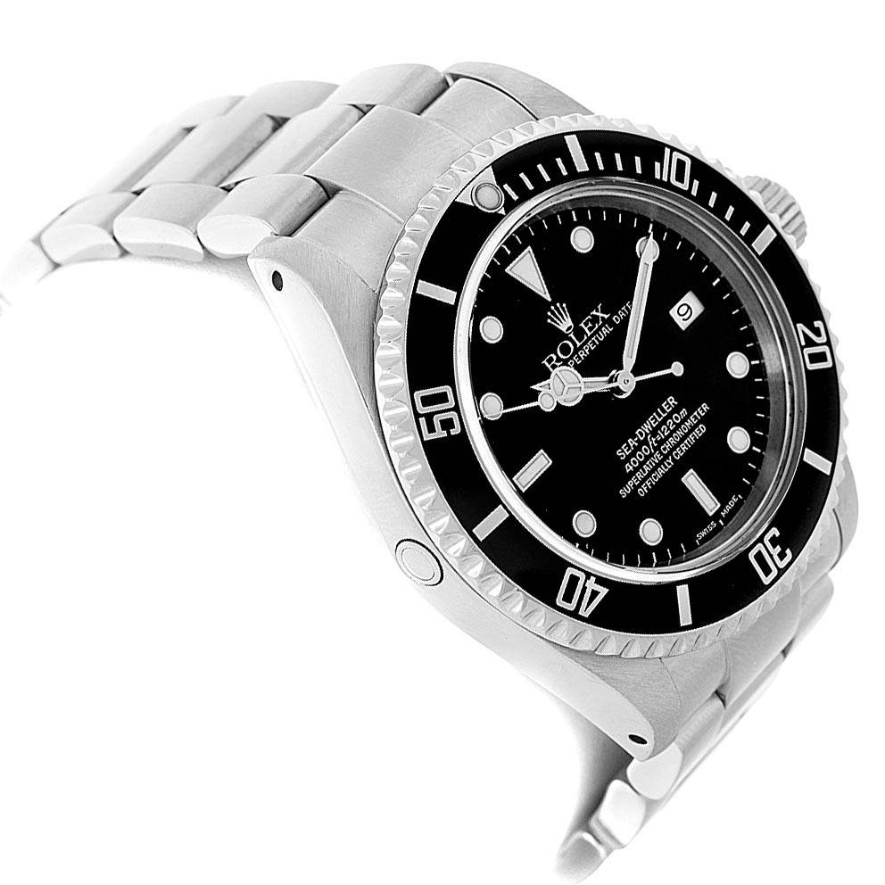 The image shows a side angle view of a Rolex Sea-Dweller 16600 Men
s Stainless Steel Black Dial 16600 Men
s Stainless Steel Black Dial watch, highlighting the bezel, face, and part of the bracelet.