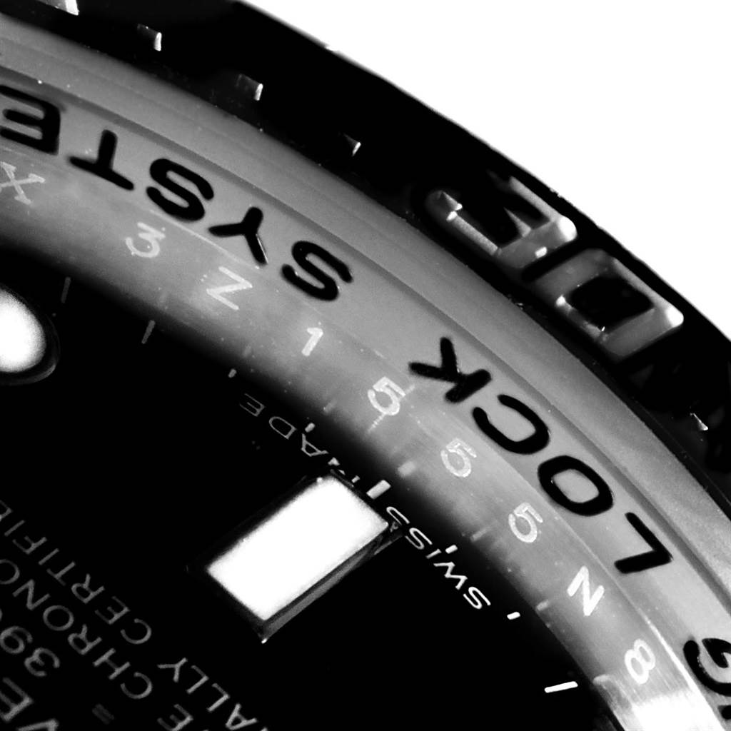 The close-up angle shows the bezel and part of the dial of the Rolex Sea-Dweller 116660 Men
s Stainless Steel Black Dial 116660 Men
s Stainless Steel Black Dial watch, highlighting the "LOCK SYSTEM" text.