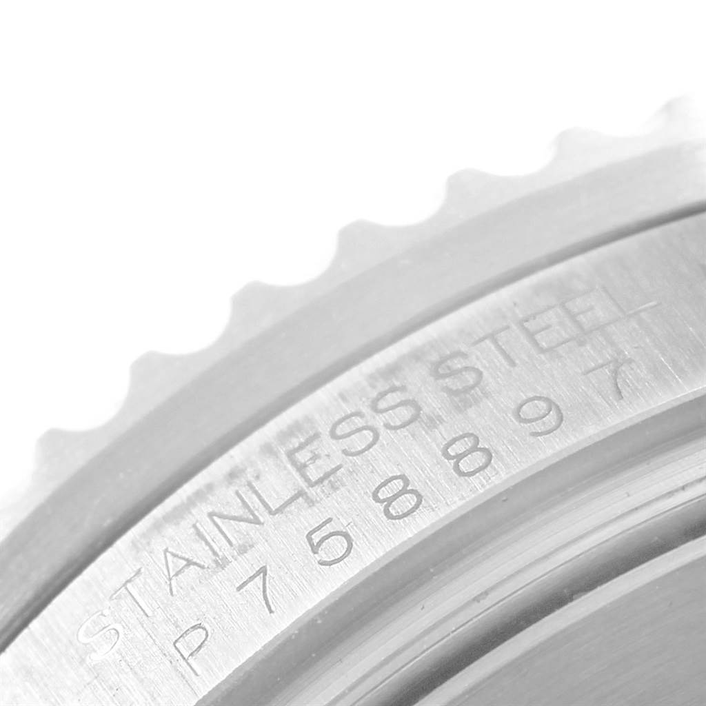 The image shows a close-up of the stainless steel bezel edge and serial number on a Rolex Sea-Dweller 16600 Men
s Stainless Steel Black Dial 16600 Men
s Stainless Steel Black Dial watch.