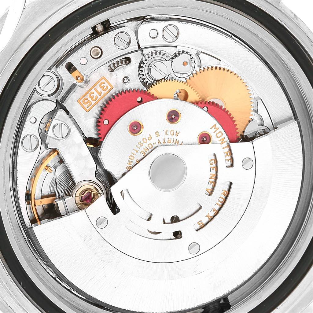 This image shows a close-up view of the internal mechanism of the Rolex Sea-Dweller 16600 Men
s Stainless Steel Black Dial 16600 Men
s Stainless Steel Black Dial watch, focusing on gears and components.