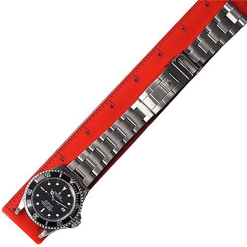 The image shows a top-down view of a Rolex Sea-Dweller 16600 Men's Stainless Steel Black Dial 16600 Men's Stainless Steel Black Dial watch with its full metal bracelet and clasp.