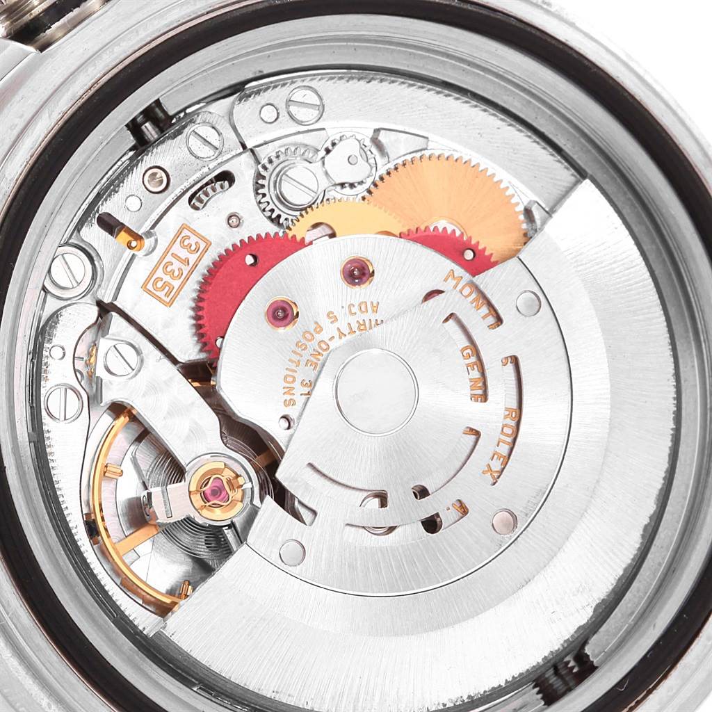 The image shows the movement and intricate internal mechanism of the Rolex Sea-Dweller 16600 Men
s Stainless Steel Black Dial 16600 Men
s Stainless Steel Black Dial watch from a close-up, top-down angle.