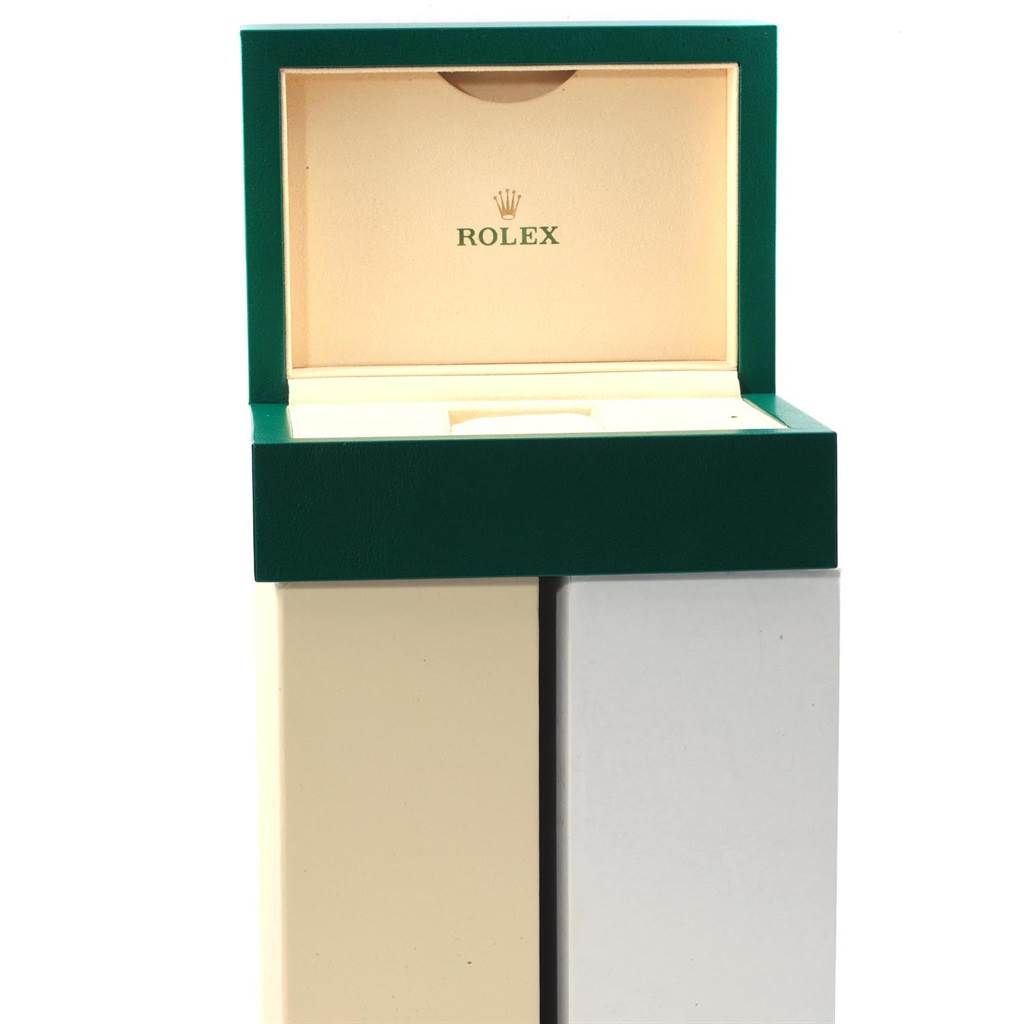This image shows an open Rolex watch box for the Sea-Dweller model, exhibiting the green and beige interior.