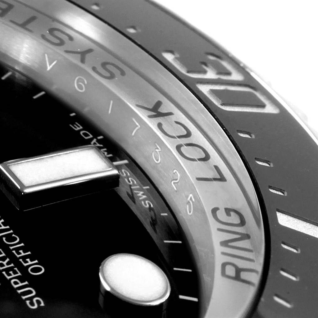 This close-up image shows the bezel and the "Ring Lock" system of the Rolex Sea-Dweller 116660 Men's Stainless Steel Black Dial 116660 Men's Stainless Steel Black Dial watch.