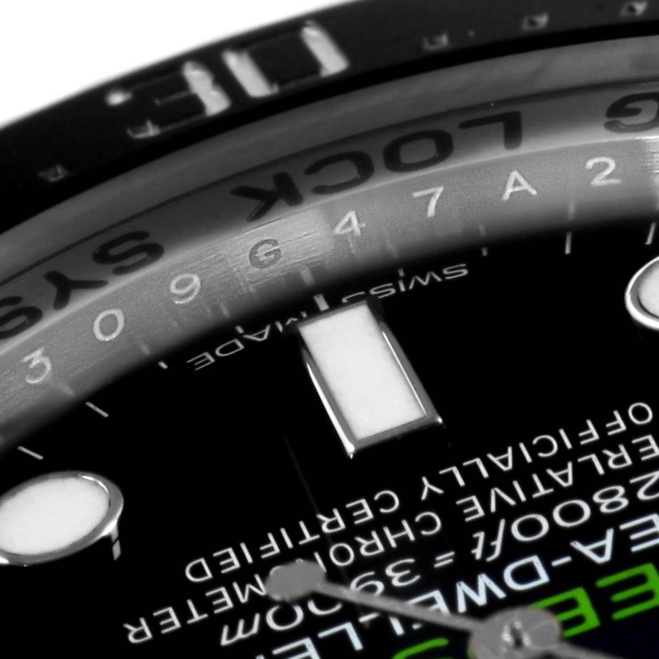 This close-up image shows the dial and part of the bezel of the Rolex Sea-Dweller 116660 Men's Stainless Steel Blue Dial 116660 Men's Stainless Steel Blue Dial watch, highlighting text and markers.