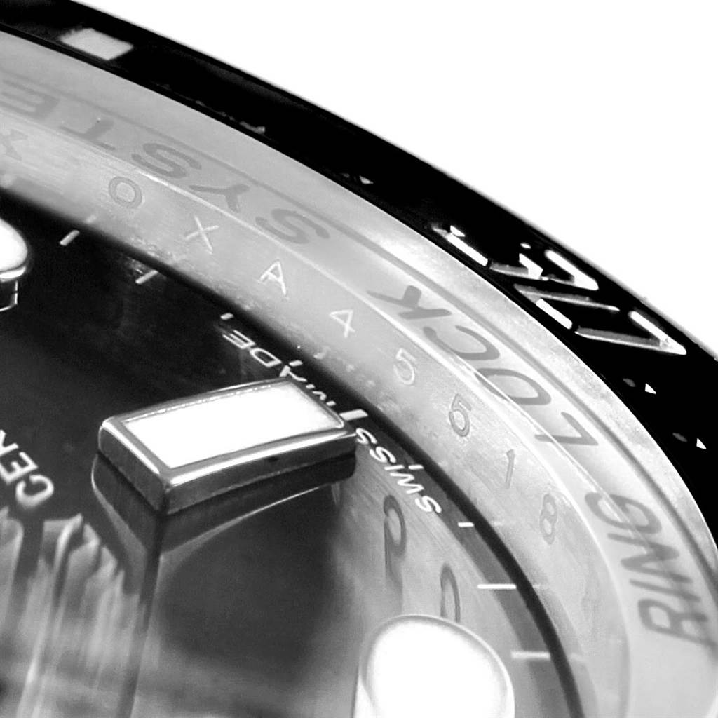 Close-up of the dial and bezel of a Rolex Sea-Dweller 116660 Men
s Stainless Steel Black Dial 116660 Men
s Stainless Steel Black Dial watch, showing the "RING LOCK SYSTEM" text.