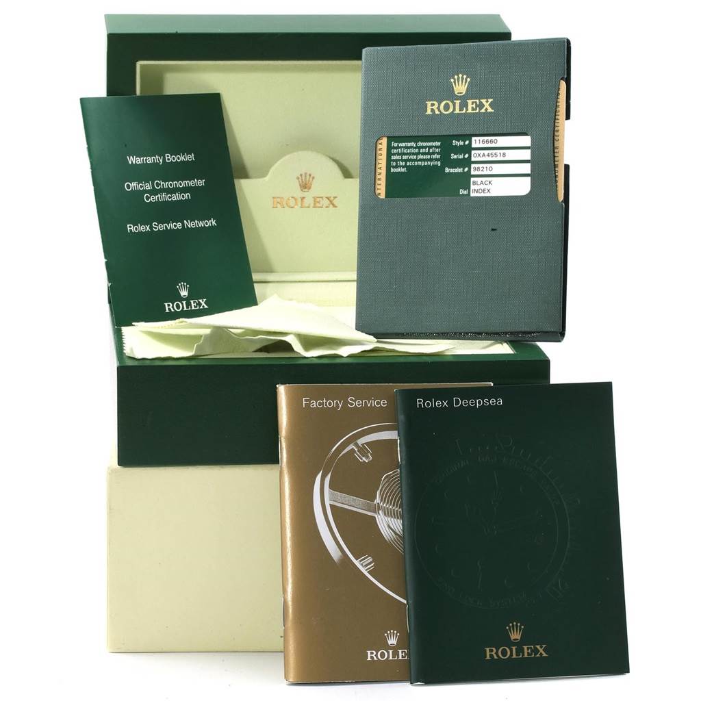 The image shows the accessories for a Rolex Sea-Dweller 116660 Men
s Stainless Steel Black Dial 116660 Men
s Stainless Steel Black Dial, including a warranty booklet, a certification card, and service booklets.