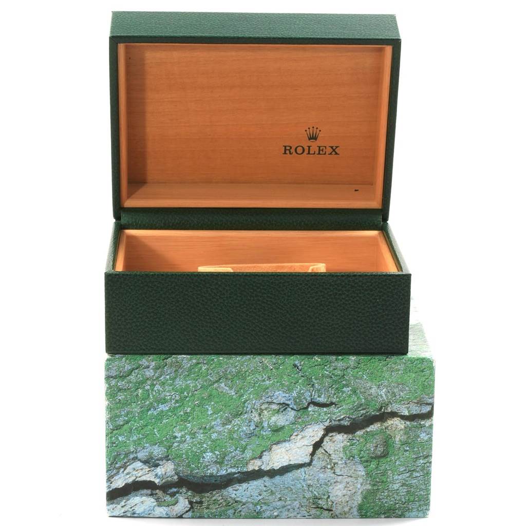 The image shows an open Rolex box for the Sea-Dweller model, viewed from the front.