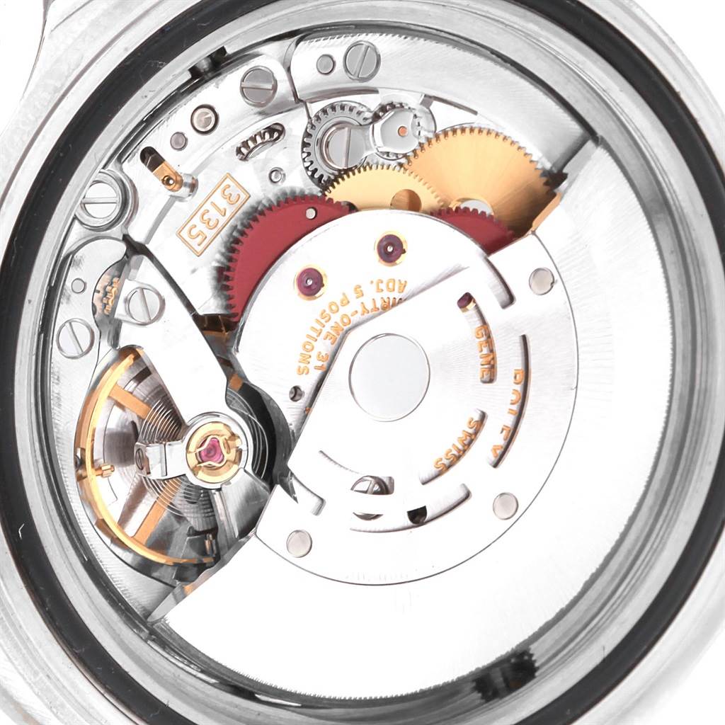 This image shows the intricate internal mechanism and movement of the Rolex Sea-Dweller 16600 Men
s Stainless Steel Black Dial 16600 Men
s Stainless Steel Black Dial watch from a close-up angle.