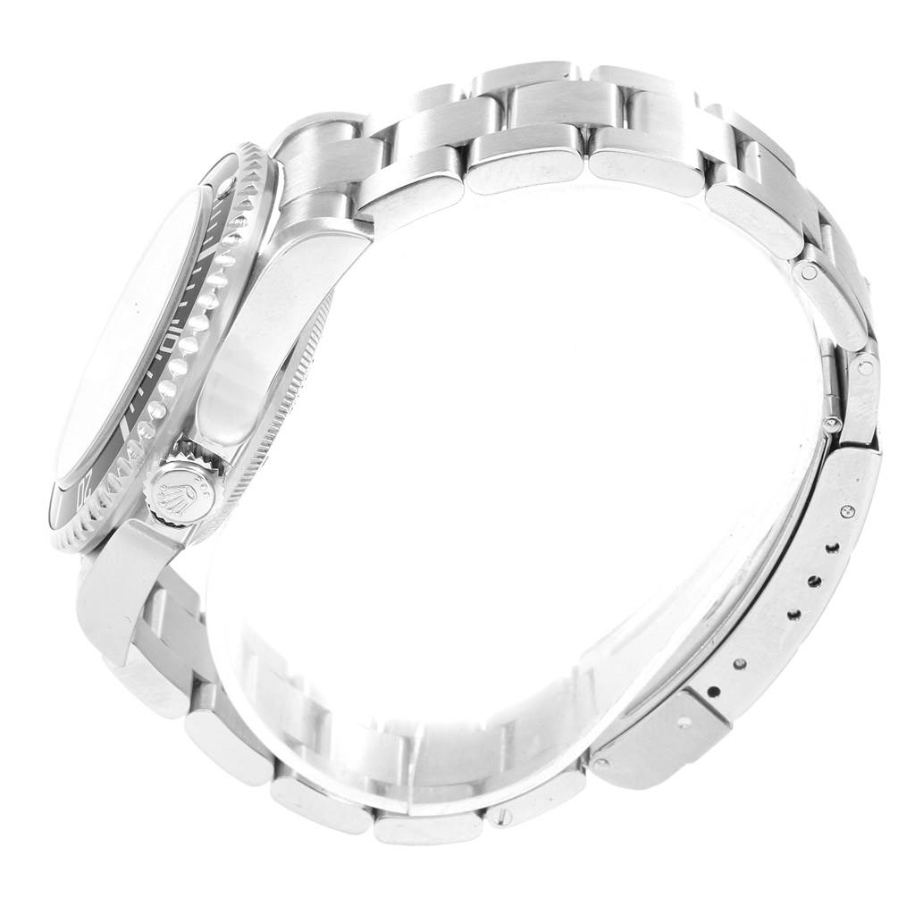 The image shows a side profile of the Rolex Sea-Dweller 16600 Men
s Stainless Steel Black Dial 16600 Men
s Stainless Steel Black Dial watch, highlighting the case, bezel, crown, and part of the bracelet.