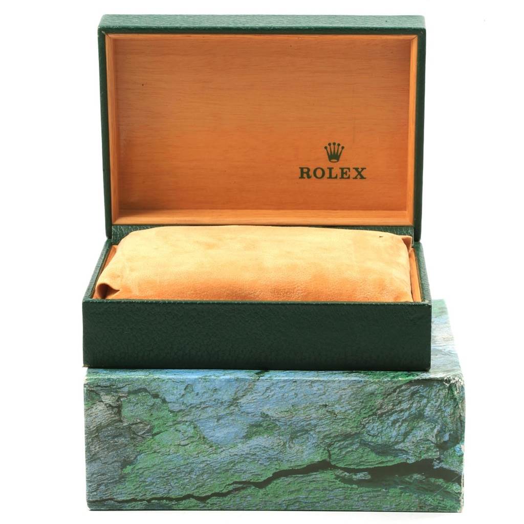 The image shows the open packaging box for a Rolex Sea-Dweller 16600 Men
s Stainless Steel Black Dial 16600 Men
s Stainless Steel Black Dial watch.